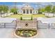 Beautiful community center with manicured lawns and inviting entrance, creating a welcoming neighborhood ambiance at 10200 Windalier Way, Roswell, GA 30076