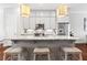 Elegant kitchen with a large island, sleek countertops, and stainless steel appliances at 10200 Windalier Way, Roswell, GA 30076