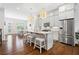 Modern kitchen with stainless steel appliances, granite countertops, and ample cabinet space at 10200 Windalier Way, Roswell, GA 30076
