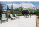 A serene pool deck area with comfortable lounge seating and a peaceful ambiance at 10200 Windalier Way, Roswell, GA 30076