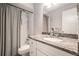 Bathroom featuring subway tile in shower and granite countertop at 3135 Seven Pines Ct # 101, Atlanta, GA 30339