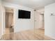 Bedroom view showcases a large flat screen tv and an attached bathroom at 3135 Seven Pines Ct # 101, Atlanta, GA 30339