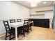 A dining room features modern light fixture and new flooring at 3135 Seven Pines Ct # 101, Atlanta, GA 30339