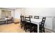 Dining room shows new flooring and access to the living room and outside at 3135 Seven Pines Ct # 101, Atlanta, GA 30339