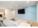 Living area showcases light wood floors, a flat screen television, and fresh paint at 3135 Seven Pines Ct # 101, Atlanta, GA 30339