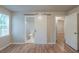 Bedroom featuring a sliding barn door to the bathroom at 3140 Delowe Dr, Atlanta, GA 30344