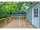 Spacious wooden deck and the home's exterior at 3140 Delowe Dr, Atlanta, GA 30344