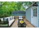 Relaxing staged deck with stylish furniture, perfect for outdoor entertaining at 3140 Delowe Dr, Atlanta, GA 30344
