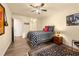 This bedroom is complete with wood-look flooring, ceiling fan, and ensuite at 3472 Essex Ave # 81, Atlanta, GA 30339