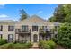 Charming condo building with multiple balconies offering great outdoor living space and mature trees at 3472 Essex Ave # 81, Atlanta, GA 30339