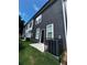 A view of the backyard and back of the townhome at 4011 Redan Rd # 8, Stone Mountain, GA 30083