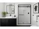 Modern bathroom showcasing a sleek black framed shower, minimalist vanity, and stylish fixtures at 4011 Redan Rd # 8, Stone Mountain, GA 30083
