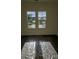 Sunlit bedroom with two windows, ready for personalization and decoration at 4011 Redan Rd # 8, Stone Mountain, GA 30083