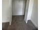 A closet with shelving and gray carpet at 4011 Redan Rd # 8, Stone Mountain, GA 30083