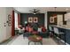 Comfortable living room featuring stylish decor, a ceiling fan, and seamlessly attached kitchen area at 4011 Redan Rd # 8, Stone Mountain, GA 30083