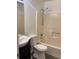 Full bathroom features a shower and tub combination with a single sink vanity at 1047 Plantation Way, Kennesaw, GA 30301