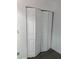 Bi-fold closet doors show a space-saving design with a modern look at 1047 Plantation Way, Kennesaw, GA 30301