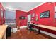 Upstairs bonus room with hardwood flooring, a dart board, and ample space for a work area at 396 15Th Nw St # 6, Atlanta, GA 30318