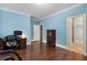 Large bonus room featuring exercise equipment and hardwood floors, offering versatile space at 396 15Th Nw St # 6, Atlanta, GA 30318