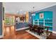Elegant dining area with hardwood floors, stylish lighting, and open view to the kitchen at 396 15Th Nw St # 6, Atlanta, GA 30318