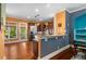 Modern kitchen with stainless steel appliances, breakfast bar, and abundant natural light from the windows at 396 15Th Nw St # 6, Atlanta, GA 30318
