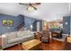 Bright living area with an open floor plan, hardwood floors, and seamless transition to the dining area at 396 15Th Nw St # 6, Atlanta, GA 30318
