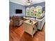 Cozy living room showcasing hardwood floors, natural light, and classic architectural details at 396 15Th Nw St # 6, Atlanta, GA 30318