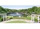Picturesque pond with a fountain, bridge, and lush green landscaping, creating a serene environment at 396 15Th Nw St # 6, Atlanta, GA 30318