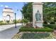 Sculpture of Justice and the Millennium Gate with colorful flowers and lush greenery at 396 15Th Nw St # 6, Atlanta, GA 30318