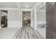 Inviting entryway features beautiful flooring, trim detail, and an open floor plan at 5180 Mirror Lake Dr, Cumming, GA 30028
