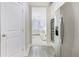 Modern kitchen with stainless steel appliances and easy access to the living room at 5180 Mirror Lake Dr, Cumming, GA 30028