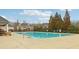 Large community pool with ample deck space for residents to enjoy at 5180 Mirror Lake Dr, Cumming, GA 30028