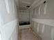A bathroom area features modern design potential with a new tub and shower at 1006 Starmoss Lane, Conyers, GA 30094