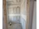 An unfinished bathroom featuring a shower and plumbing; waiting to be completed with new fixtures at 1006 Starmoss Lane, Conyers, GA 30094