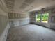 Unfinished bedroom with abundant natural light from large windows and a flexible floorplan at 1006 Starmoss Lane, Conyers, GA 30094