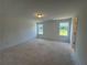 Bright bedroom with two windows that offer ample natural light and a neutral color palette at 1006 Starmoss Lane, Conyers, GA 30094