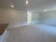 Bright living room with granite countertops, recessed lighting, and an open floor plan at 1006 Starmoss Lane, Conyers, GA 30094