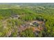 Two secluded homes surrounded by a lush forest at 281 Abbott Dr, Canton, GA 30114