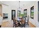 Breakfast nook with built-in oven, dining table, and natural light provides a cozy space to eat at 281 Abbott Dr, Canton, GA 30114