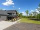 Gorgeous exterior view of home with welcoming porch and scenic backyard at 281 Abbott Dr, Canton, GA 30114