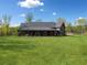 Sprawling backyard and covered patio offer relaxation space for outdoor living at 281 Abbott Dr, Canton, GA 30114