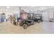 Organized garage featuring golf carts, toolboxes, and ample storage space at 281 Abbott Dr, Canton, GA 30114