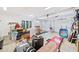 Spacious garage interior with two doors, lots of storage and overhead lighting at 281 Abbott Dr, Canton, GA 30114