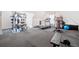 Well-equipped home gym featuring modern machines, weights, and a padded floor at 281 Abbott Dr, Canton, GA 30114