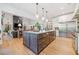 Modern kitchen with a large island, granite countertops, stainless steel appliances, and an open layout at 281 Abbott Dr, Canton, GA 30114