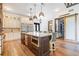 Spacious kitchen featuring a large center island, stainless steel appliances, and a walk-in pantry at 281 Abbott Dr, Canton, GA 30114