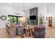 Spacious living room features a floor to ceiling fireplace, hardwood floors, and comfortable seating at 281 Abbott Dr, Canton, GA 30114