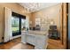 Home office featuring an oversized window, barn door access, and a wooden desk at 281 Abbott Dr, Canton, GA 30114