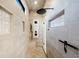 Modern shower featuring tile walls, a rain shower head, and a built-in bench at 281 Abbott Dr, Canton, GA 30114