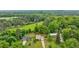 Aerial view of home with lush surroundings at 3909 Ebenezer Rd, Marietta, GA 30066
